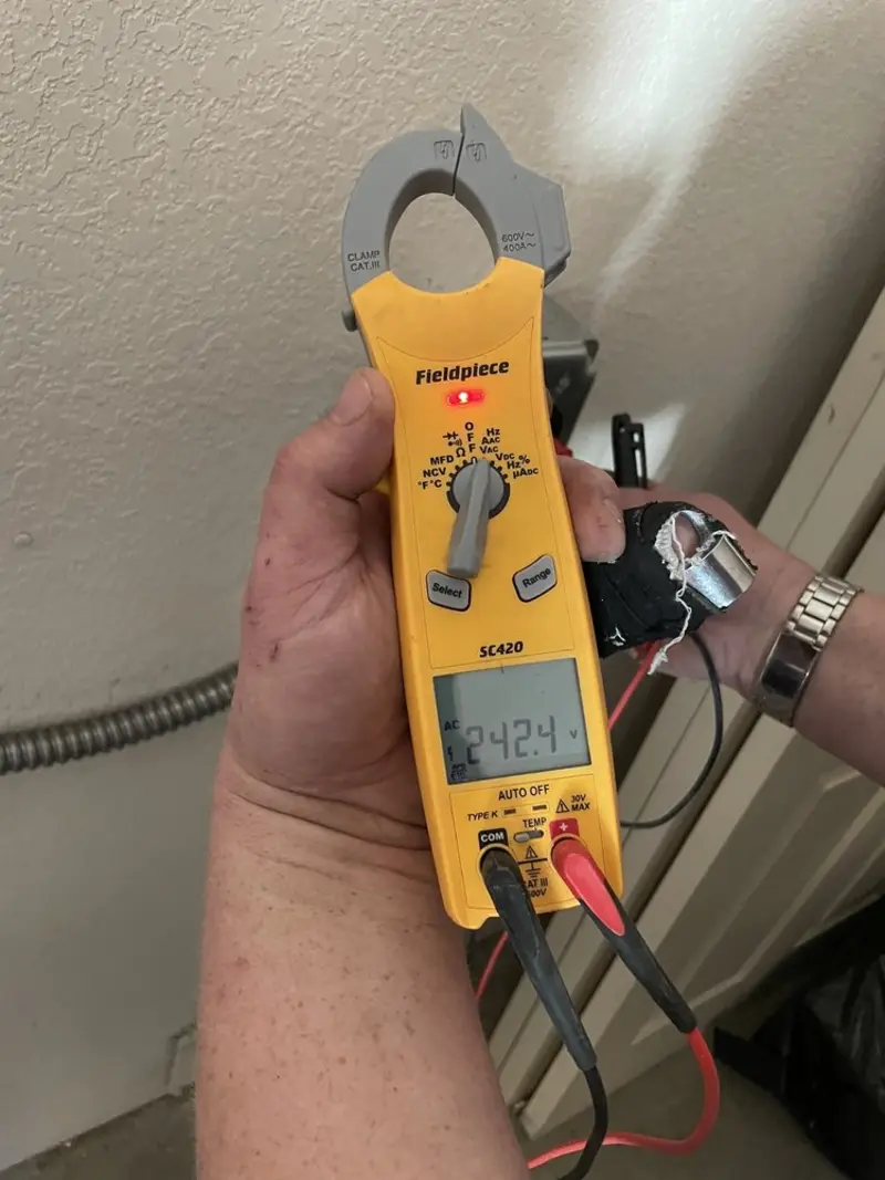 Voltage testing with clamp meter during Hot Tub / Pool Electrical Wiring in Meriden